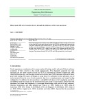 Mixed mode I/II stress intensity factors through the thickness of disc type specimens