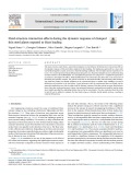 Fluid-structure interaction effects during the dynamic response of clamped thin steel plates exposed to blast loading